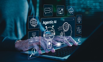 A man's hand type on a computer laptop with an overlays screen of graphics depicting and AI agent. 