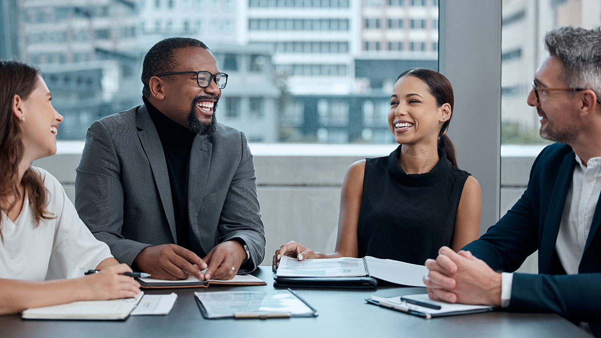 Business people working around a table.
