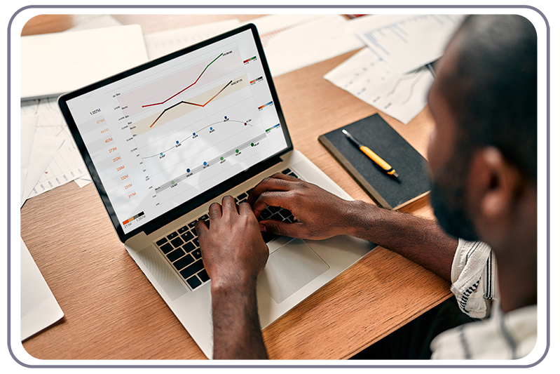 Finance executive working on laptop