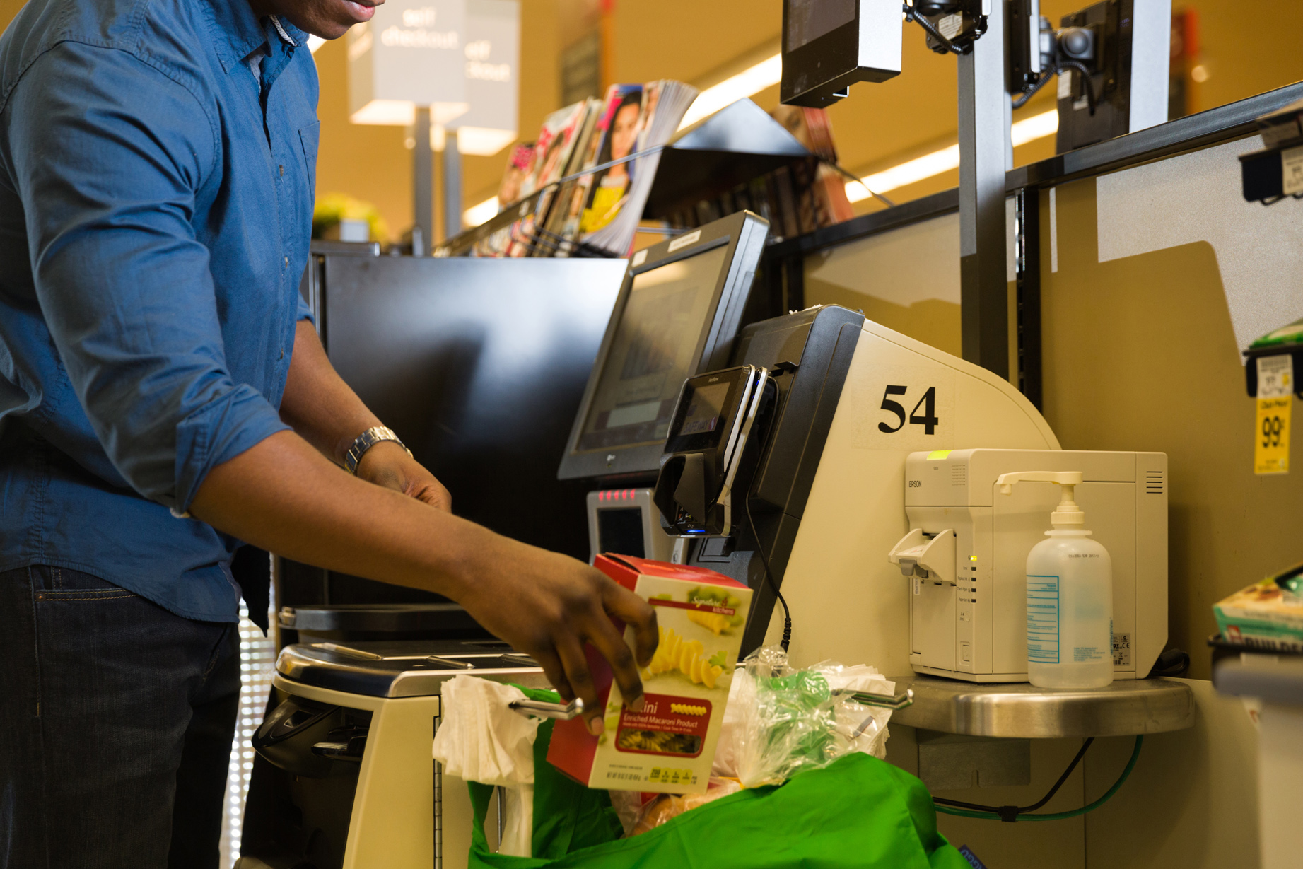 A person using self checkout
