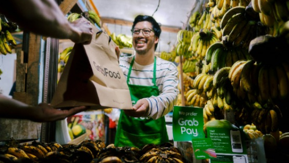 person selling bananas